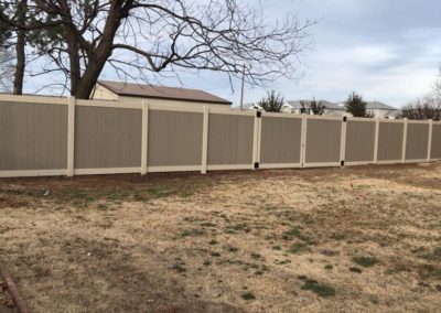 6' tall textured tan post and rails with driftwood pickets